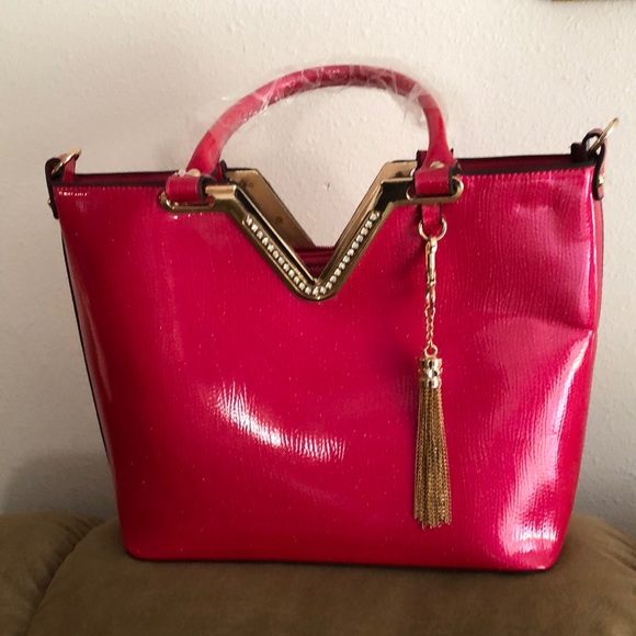 Elegant Hot Pink Handbag with Gold Accents - Picture 1 of 2